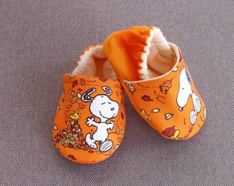 orange baby shoes
