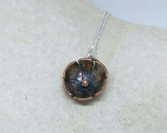 Hand fabricated copper flower pendant
