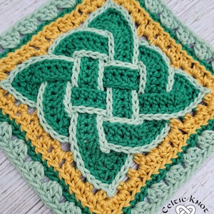 May include: A green, yellow, and light green crochet square with a Celtic knot design. The square is framed with a border of alternating single and double crochet stitches.