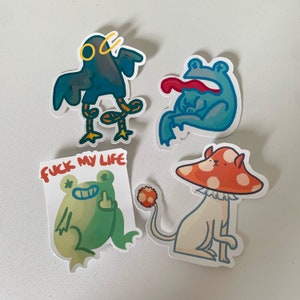 Stickers mats dessinés à la main (Silly Bird, Chat champignon, Grenouille FML et Grenouille langue)