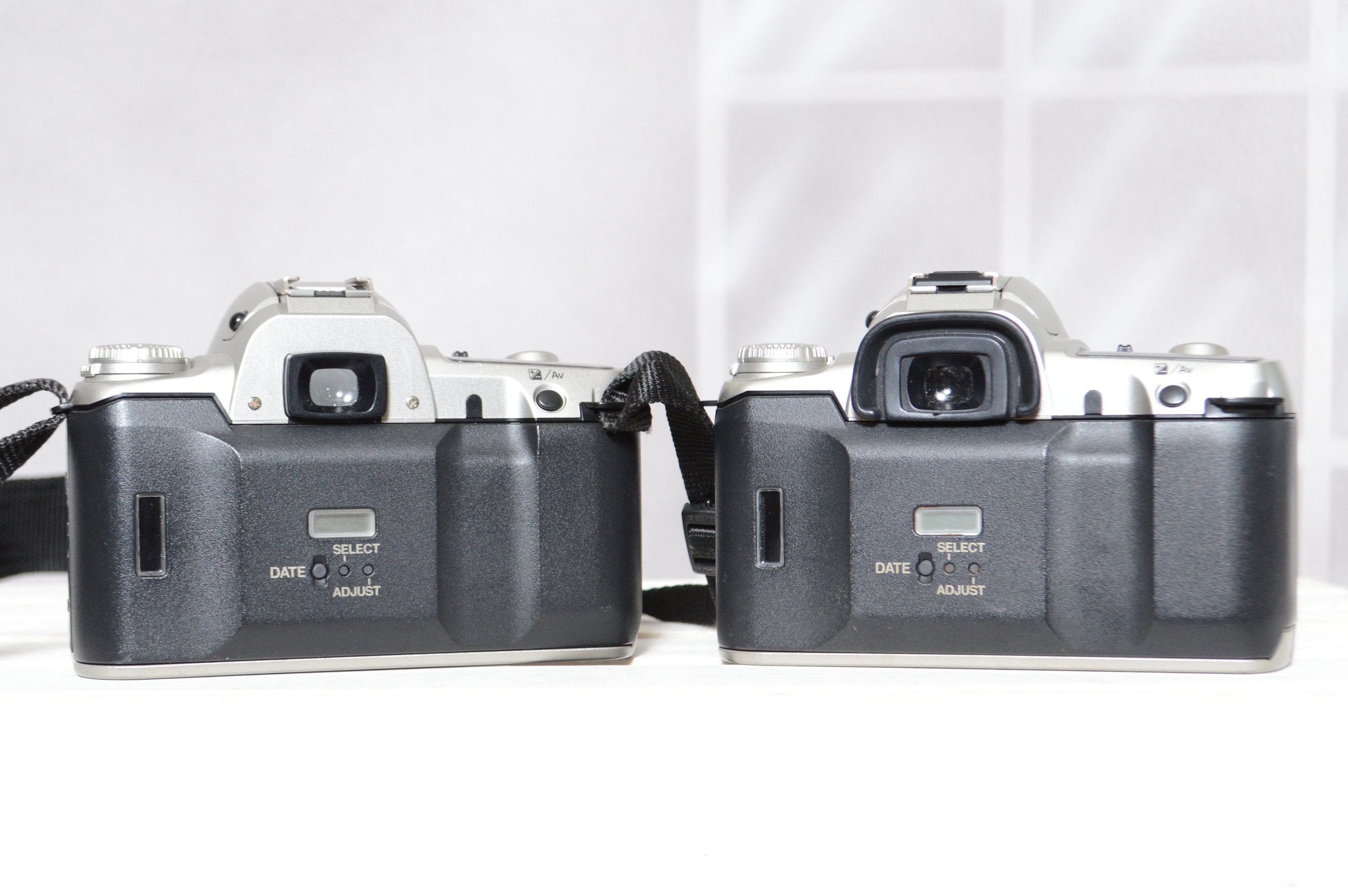 Two Vintage Pentax ZX-50 35mm film slr cameras for PARTS / REPAIR
