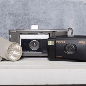 Vintage Polaroid products - Polaroid Land Camera Model J66, Captiva and Wink Light Instant Film Camera