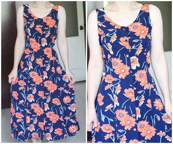 navy dress with orange flowers