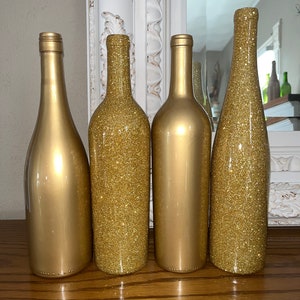 Gold wine bottle centerpieces