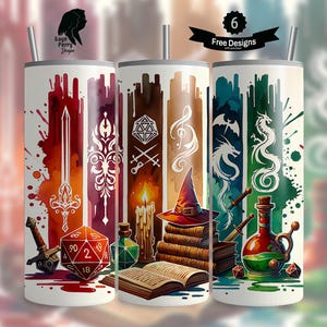 May include: Six different designs for a stainless steel tumbler featuring fantasy and role-playing game themes. The designs include a sword, a dragon, a wizard's hat, a dice, and a potion bottle. The tumblers are white with colourful watercolour-style designs.