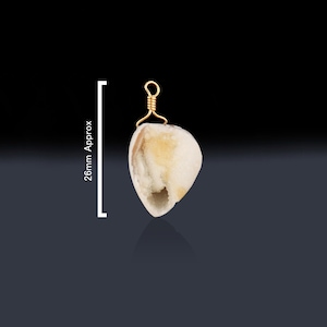 May include: A white geode pendant with a gold wire loop. The geode is approximately 26mm in size.