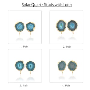 May include: Four pairs of blue and gold solar quartz stud earrings with loops. Each pair features a different pattern of blue and gold.