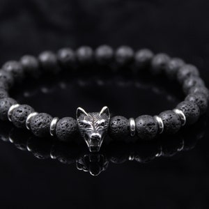 Pulsera de lava para hombre, pulsera con cabeza de lobo y cuentas, pulsera elástica negra y plateada, idea de regalo para hombres.