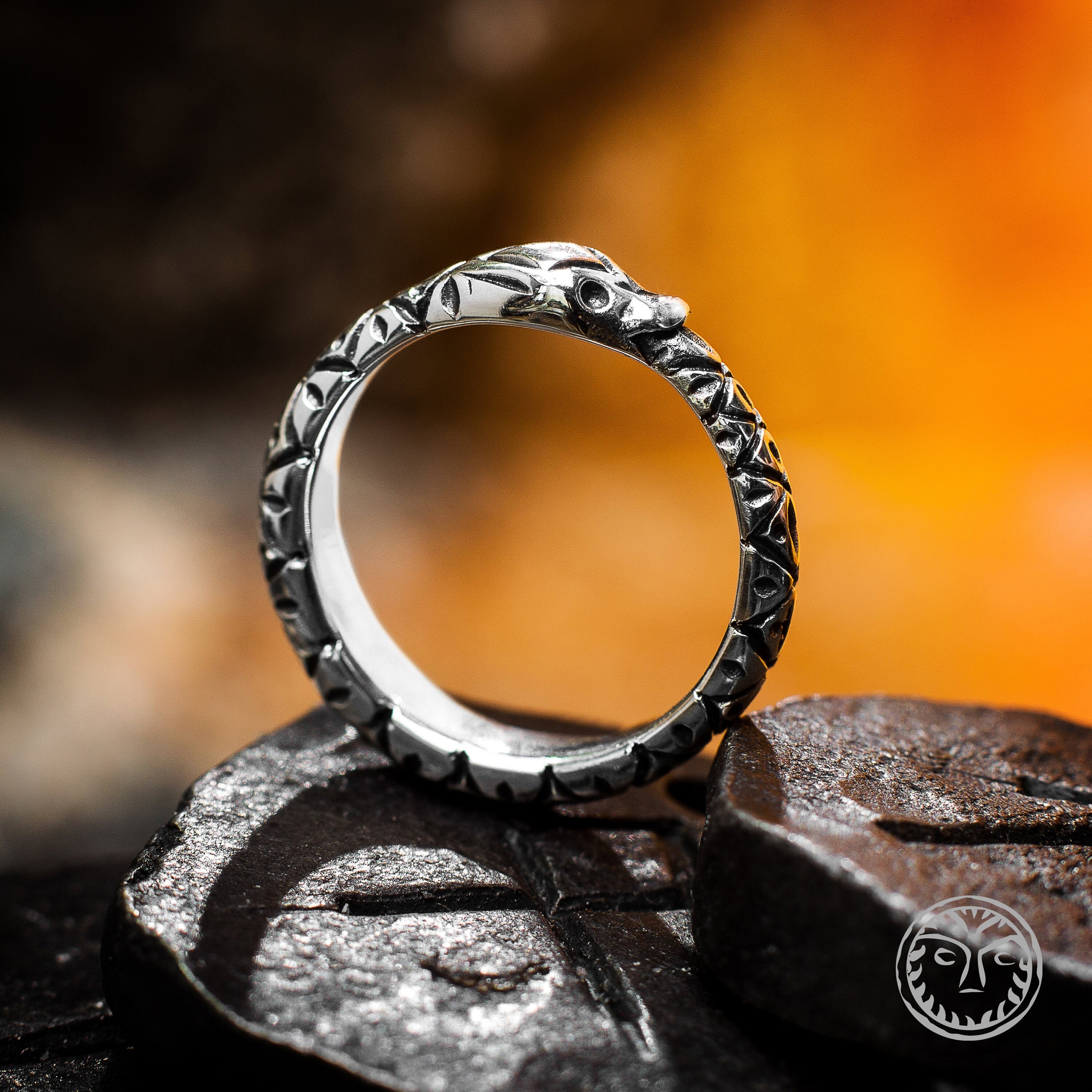 World serpent best sale ring