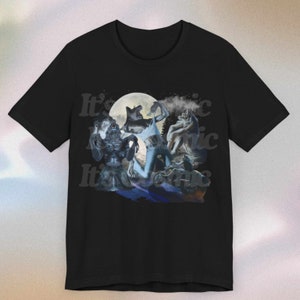 May include: Black t-shirt with a graphic of werewolves under a full moon. The design includes the text "It's Iconic" in a repeating pattern. The artwork depicts several werewolf figures in various poses, with a dark, atmospheric style.