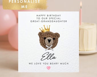 May include: A personalized birthday card with a crocheted bear wearing a gold crown. The card reads "Happy Birthday to our special Great-Granddaughter Ella, We love you beary much." Pink balloons and a small cake are in the background.