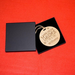Personalised Oak Veneer Christmas Bauble: Engraved First Christmas Ornament