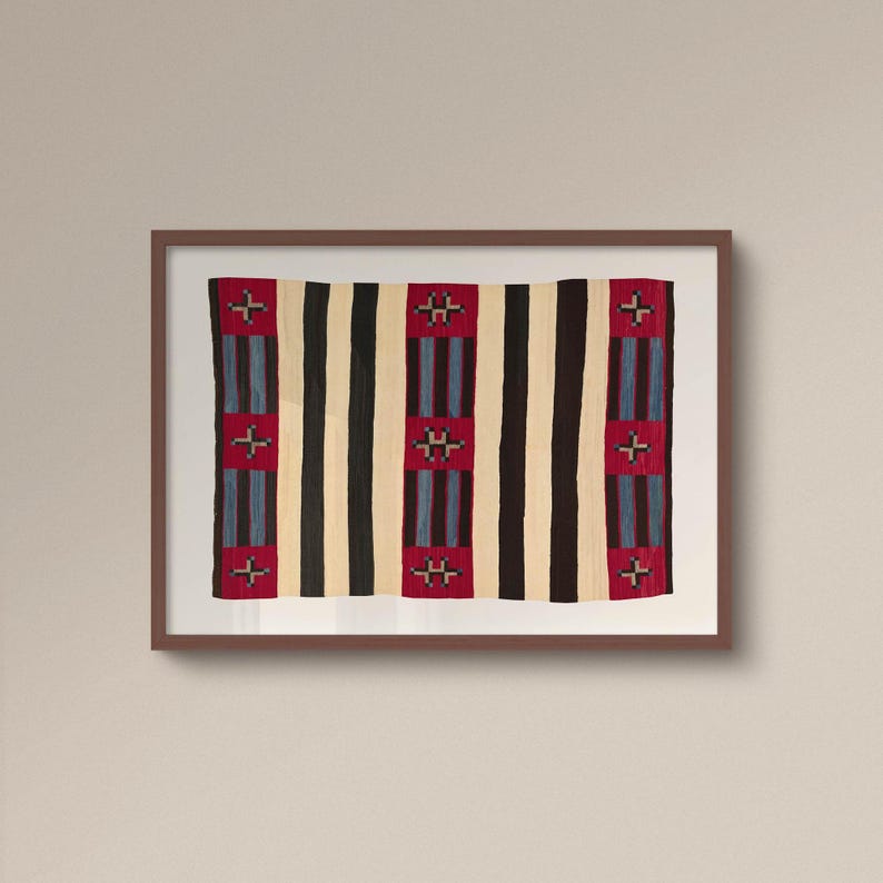 May include: Framed textile art featuring a woven design with vertical stripes in black, cream, and red. The red sections have cross-like patterns and blue stripes. The artwork is displayed in a brown frame.