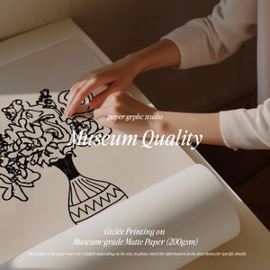 May include: A black and white line drawing of a bouquet of flowers in a vase. The drawing is on a beige background with the text "paper grphc studio" and "Museum Quality" in black. The text "Gicl&eacute;e Printing on Museum-grade Matte Paper (200gsm)" is also in black.