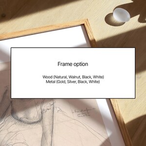 May include: A framed artwork with a light wood frame. The artwork is a pencil sketch. The frame options are wood in natural, walnut, black, and white, and metal in gold, silver, black, and white.