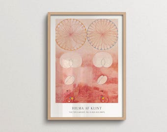 May include: A framed art print featuring Hilma af Klint's The Ten Largest, No. 9, Old Age (1907). The artwork displays abstract circular patterns, soft pink and peach watercolor tones, and geometric shapes. The text reads Hilma af Klint, The Ten Largest, No. 9, Old Age (1907) at the bottom.