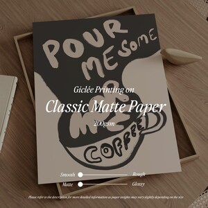 May include: A black and white illustration of a coffee cup with the text "Pour Me Some Coffee" and "Gicl&eacute;e Printing on Classic Matte Paper 200gsm".