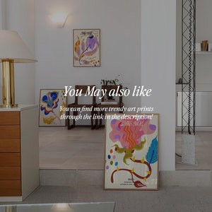May include: Three framed abstract art prints with colorful floral designs. The prints are hanging on a white wall in a modern home interior. The text "You May also like" and "You can find more trendy art prints through the link in the description!" is visible below the prints. The text "paper grphc studio" is visible at the bottom of the image.