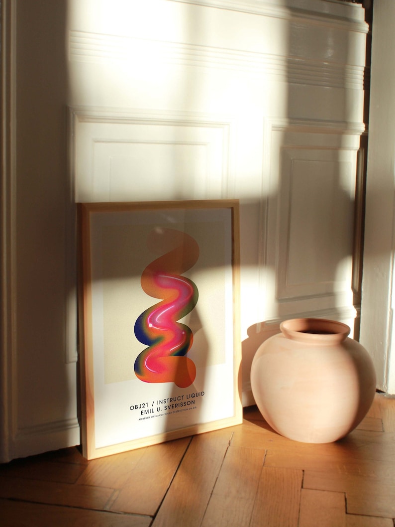 May include: A framed poster with a colorful abstract design in shades of orange, pink, blue, and green. The poster is titled "OBJ21 / INSTRUCT LIQUID EMIL U. SVERISSON".