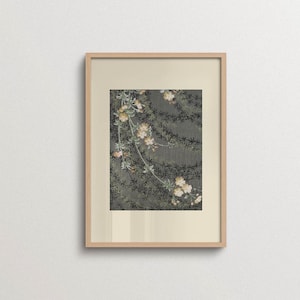 Vintage floral textile drawing with delicate cream flowers and dark trailing branches on a muted gray background, displayed in a natural oak frame. Botanical wall art for Japandi, eclectic, and neutral modern interiors.