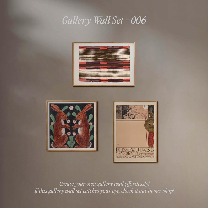 May include: A gallery wall set with three framed prints. The top print features a geometric pattern in shades of red, brown, and white. The left print features two brown rabbits with white flowers and green leaves. The right print features a vintage poster with the text "EKUSTAMIS TEIVING DECESSIONS GARTENIN".