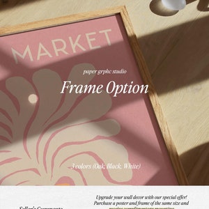 May include: A framed poster with a pink and white abstract floral design. The frame is made of wood and has a light brown finish. The poster is titled "MARKET" and is from the "paper grphc studio". The text "Frame Option" is also visible on the poster. The poster is available in three colors: oak, black, and white.