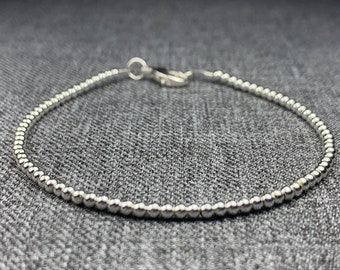 Silver Hematite Bracelet made with small 2mm round genuine gemstone beads