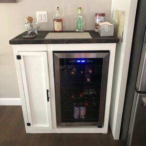 We ship to Texas as of 11-5-24 Farmhouse style mini fridge cabinet / Smaller barn door hinge on this cabinet / Modern  cabinet with small sh