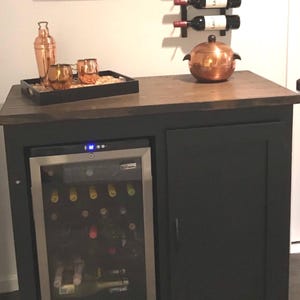 Farmhouse style Enclosed mini fridge cabinet with a single hinge door/ / modern style / wine bar / storage we ship to Texas as of 11-5-24