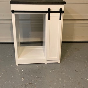 Modern style mini fridge cabinet / Smaller barn door slider on this cabinet / Modern wine bar / Storage cabinet