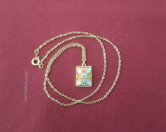 Pretty Gold colored Chain Necklace with Rhinestone Pendant