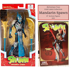 May include: A Mandarin Spawn action figure from the McFarlane Toys Gold Label Collection. The 8-inch figure is in a clear plastic package with a red and gold design. The figure is blue, black, and gold, with two gold weapons.