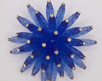 Broche/prendedor vintage Vendome con diseño de anémona marina azul en forma de estrella.