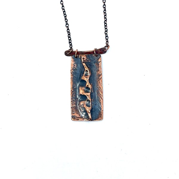 Handmade copper form fold metal work pendant