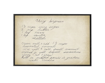 May include: Handwritten recipe for Cherry Surprises, a dessert made with icing sugar, butter, cream, vanilla, and desiccated coconut. The recipe instructs to cream the ingredients together, add the coconut, and roll the mixture around a drained maraschino cherry. The finished dessert is then rolled in crushed peanuts or graham cracker crumbs.