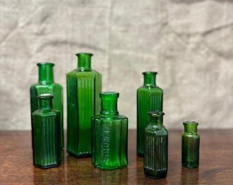 Seven Green Poison Apothecary Chemist Bottles