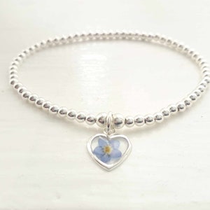 Sterling silver and real pressed forget me not flower beaded stretch stacking bracelet. Forget me not bracelet image 1