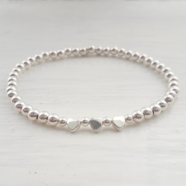 Sterling silver beaded heart stretch stacking bracelet. Silver heart beaded bracelet
