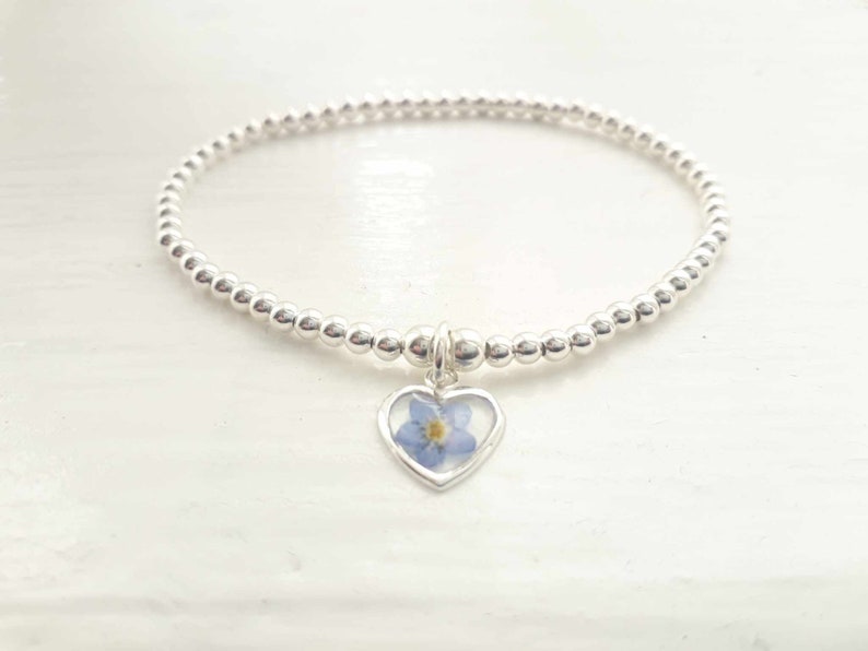 Sterling silver and real pressed forget me not flower beaded stretch stacking bracelet. Forget me not bracelet image 1