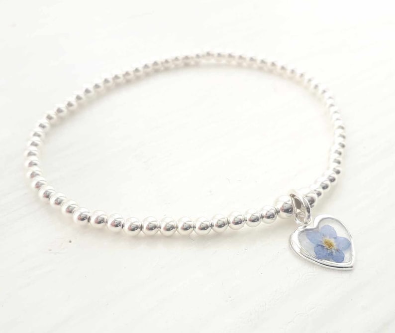 Sterling silver and real pressed forget me not flower beaded stretch stacking bracelet. Forget me not bracelet image 2