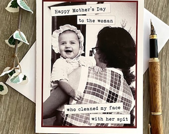 May include: A vintage-style greeting card with a photo of a woman holding a baby. The card reads "Happy Mother's Day to the woman who cleaned my face with her spit."
