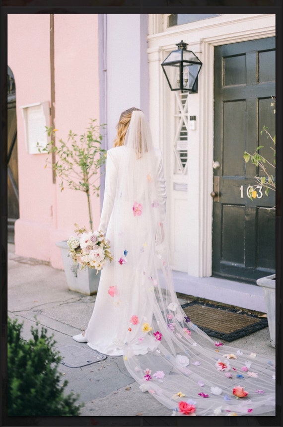 wedding dress with pastel flowers