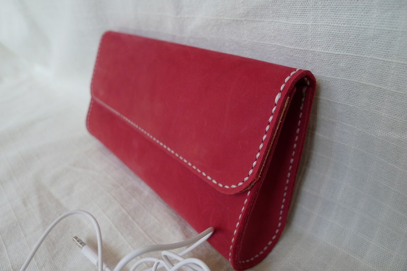 Distressed leather clutch with magnetic button snaps