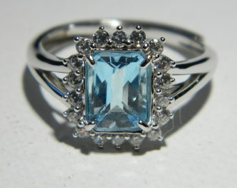 TOPAZ - Aqua Blue Emerald Checkerboard Cut 1.8 ct Topaz with CZ Halo Sterling Silver Ring