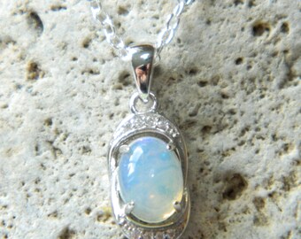 OPAL - Translucent Honey Comb Welo Opal 1.14 ct Oval with Blue and Green Flashes Sterling Silver Pendant Necklace with CZ Accents