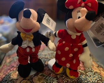 Disney World Velvet Mickey and Minnie plush with stands.