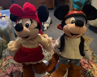 Walt Disney Pirate Mickey and Minnie plush with stands.