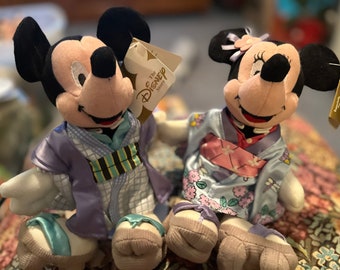 Disney World Globe Trotting Japanese Mickey and Minnie plush with stands.