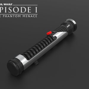 May include: A black and silver lightsaber with a red button. The lightsaber is from the Star Wars Episode I: The Phantom Menace movie.