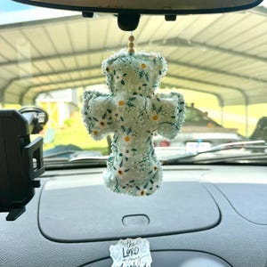 Cruz de espejo de coche